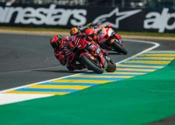 Bagnaia climbs on the third step of the podium in the Sprint race at Le Mans.