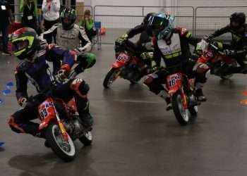Saturday Mini Road racing Instructor Demonstration race for the Super Sonic Road Race School at the International Motorcycle SuperShow, and Bridgestone CSBK ace Tomas Casas leads the pack on spec Honda 50s from Kawasaki Superbike legend Jordan Szoke, CSBK twins racer Darin Marshall, Erik Tanasic and Lightweight front runner Jared Walker.